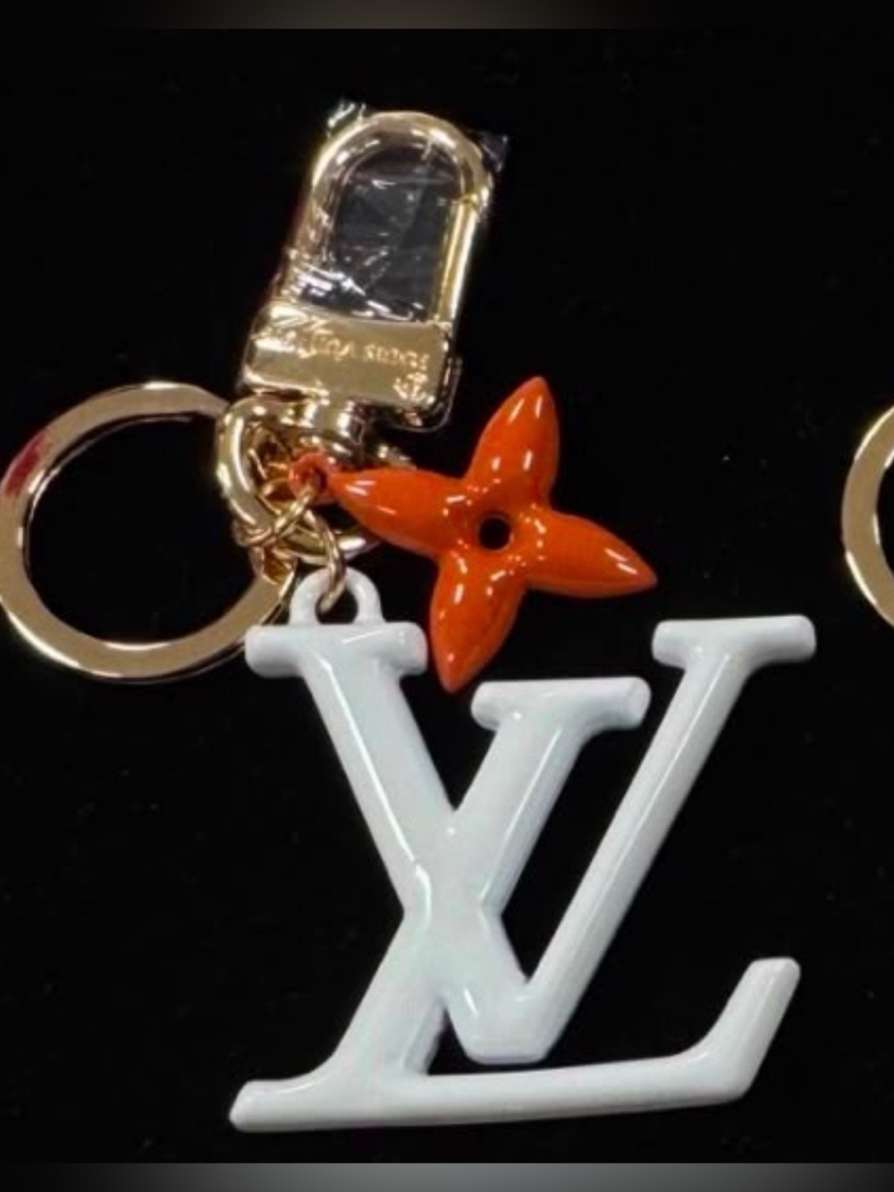 Inspired Lulu Logo Keychain in White & Orange Like New